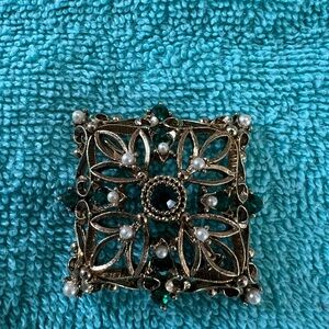 Elegant Gold and Green Symmetrical Brooch